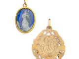 two gold pendants with a picture of a woman and a man