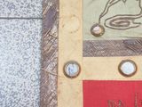 a picture of a picture of a wall hanging on the side of a building