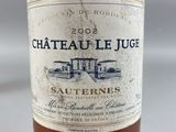 a bottle of wine that is sitting on a table