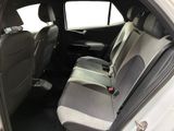 the back seats of a car are empty and the passenger seat is empty