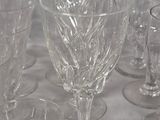 a lot of empty wine glasses sitting on a table
