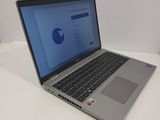 a laptop computer that is sitting on a table