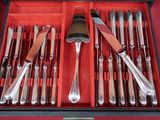 a box of silverware that is sitting on a table