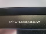 the back of a laptop with the words mc - labacow written on it