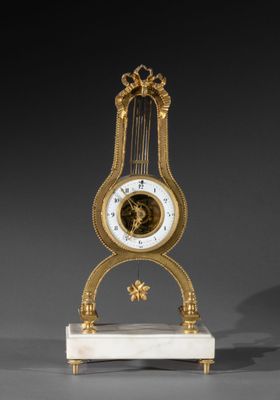Pendule lyre en bronze doré reposant sur une base en marbre … - Photo 1