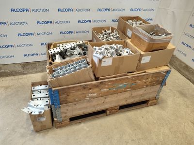 several boxes of assorted metal parts are stacked on a pallet