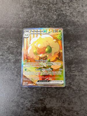 a close up of a pokemon card on a table