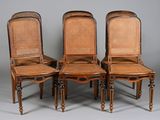 four antique chairs with cane back and cane back legs