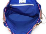 the back view of a blue backpack with a red zipper
