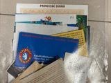 a plastic bag with a lot of items inside of it