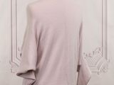 an image of a mannequin mannequin with a pink sweater on it
