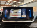 a picture of a car dashboard with a camera mounted on it