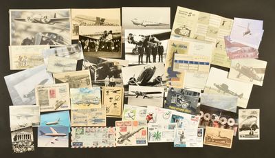 a lot of old postcards on a black surface