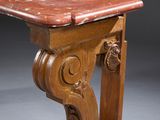 a wooden table with a marble top on it