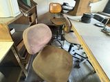 a desk with a chair and a computer on it