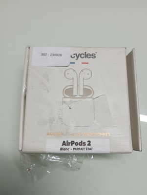 a box with a pair of earphones in it