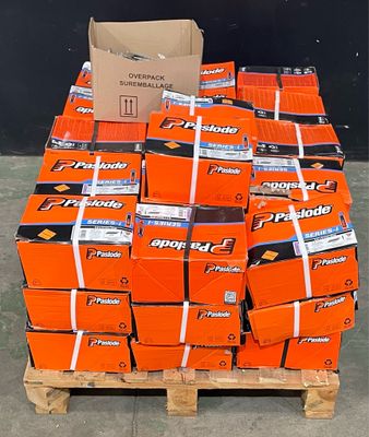 a pallet full of orange boxes on top of a pallet