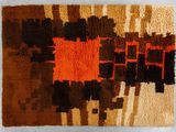 an image of a close up of a rug on a white surface
