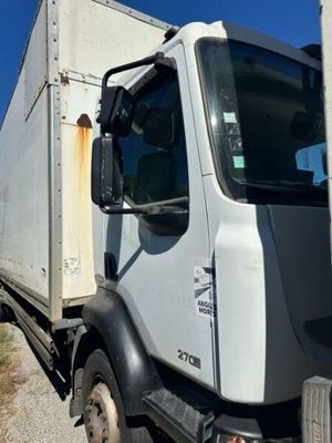 a truck that is parked on the side of the road
