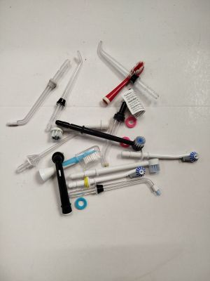 many different types of toothbrushes on the table