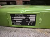 a close up of a green box with a label on it