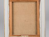 an old picture frame with a picture of a cat in it