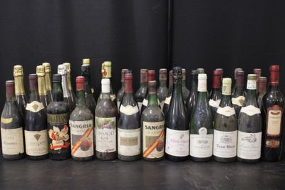 many bottles of wine lined up on a table