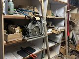 a room with a lot of tools on the shelves