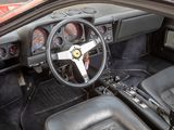 a dashboard and steering wheel of a car in a car showroom