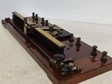 a small model of a steam engine sitting on a table