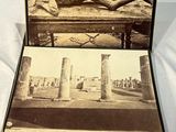 a picture of a woman laying on a bed in a case