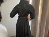 a statue of a woman that is standing on a table