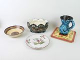 many different types of pottery on the table