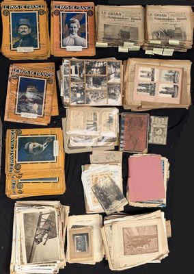 several old books are stacked on top of each other on a table