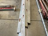 many pieces of wood that are laying on the floor