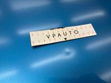 an image of a sticker with the word vauto on it