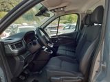 the interior of a car with the driver ' s seat folded down