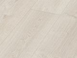 a close up view of a white wood floor with a light colored finish