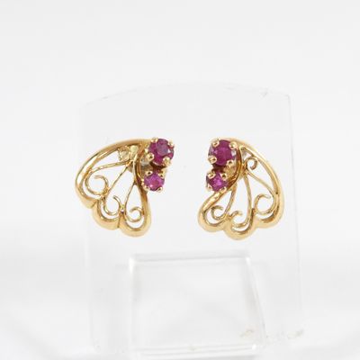 an image of a pair of gold and ruby earrings
