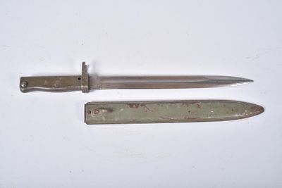 a knife and a knife blade on a white surface