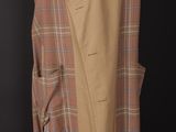 an image of a tan and brown plaid coat on a mannequin mannequin