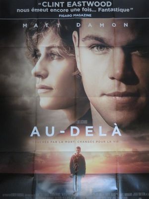 une image représentant une affiche de film sur laquelle figurent un homme et une femme debout face à un coucher de soleil