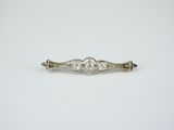 an antique silver and diamond broochle