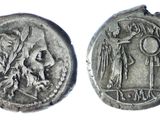 a close up of a coin with an image of a man and a woman on it