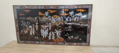 une image d'un tableau sur le mur d'une pièce