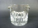 a glass vase that is sitting on a table