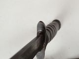a close up of a pair of scissors on a table