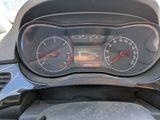 a close up of a car dashboard with a speedometer and gauges
