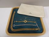 a tray with a lot of jewelry on it