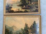 Deux tableaux représentant un paysage de montagne sont accrochés au mur.